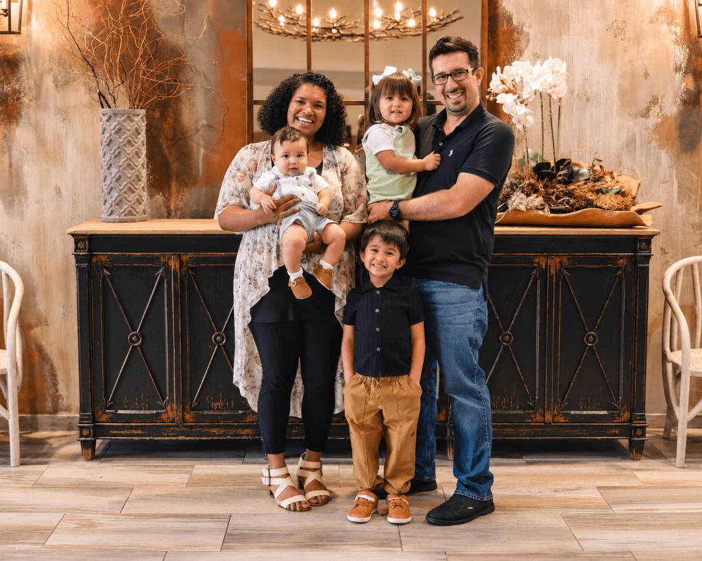 Kyle Greer with his wife and three children